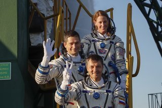 Loral O'HaraLeur, Nikolai Chub et Oleg Kononenko (de haut en bas) ont quitté le cosmodrome russe de Baïkonour au Kazakhstan comme prévu.